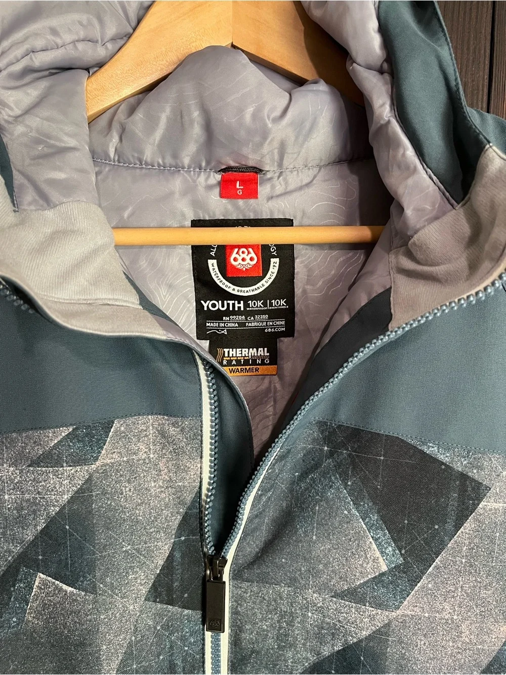 686 Youth Hooded Rain Jacket in Slate Blue & Mauve